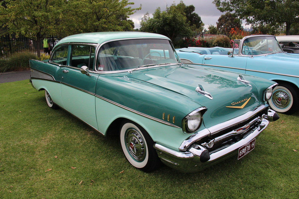 A restored 1957 Chevrolet Bel Air in turquoise and white